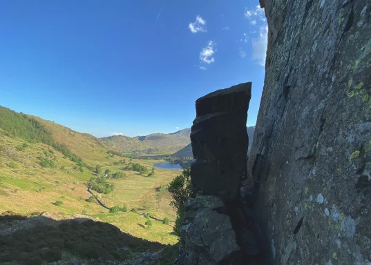 The Squeeze - a Rock Column on Side Pike with Blea Tarn behind it