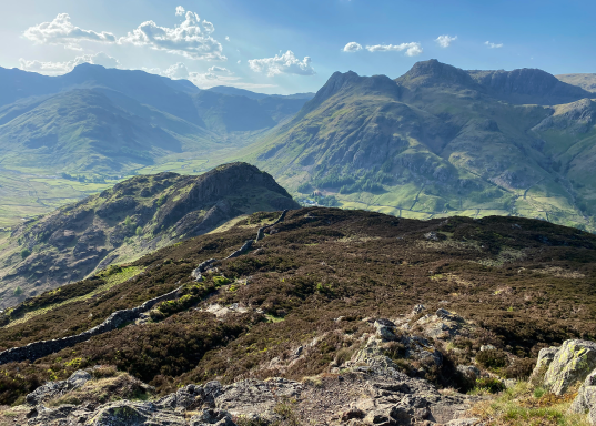 Landscape view looking down from Lingmoor Fell to Side Pike and Langdale Pikes behind