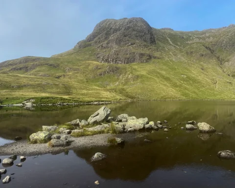 A perfectly still Stickle Tarn on a sunny day
